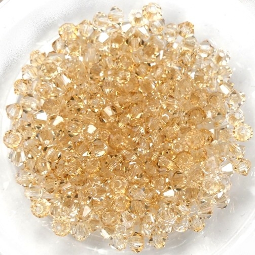 03-MC-00010-23501 Bicones Crystal Honey. 50 Pc-0