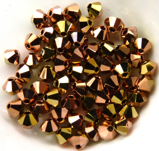 03-MC-00010-27101-26441 Bicones Crystal Capri Gold/Brass 3 mm. 50 Pc.-0