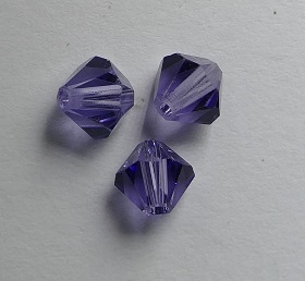 SW-05-TAN 5301 Tanzanite Swarovski Bicone 5 mm. 10 Pc.-0