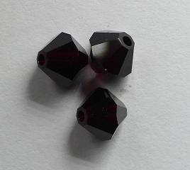 SW-05-GT 5301 Garnet Swarovski Bicone 5 mm. 10 Pc.-0